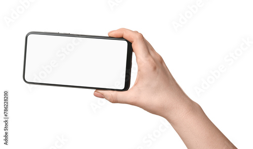 Woman holding smartphone with blank screen on white background, closeup. Mockup for design