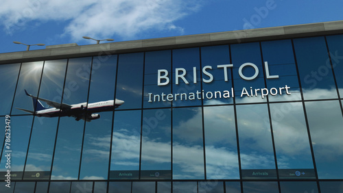 Airplane landing at Bristol UK, GB, England airport mirrored in terminal