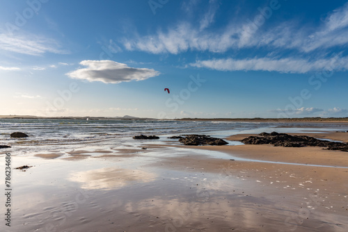 Fototapeta Naklejka Na Ścianę i Meble -  Low tide reflections at Rhosneigr beach, Anglesey