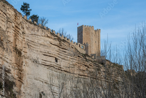 Alcalá del Júcar castle is located on a rock formed by the gorge of the Júcar River, from where the entire town can be seen, in the province of Albacete, La Manchuela, Castila la Mancha, Spain photo