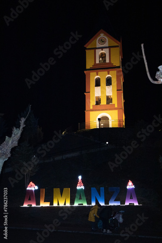 Almanza town at Christmas in which you can see the church with its Almanza sign with Christmas hats photo