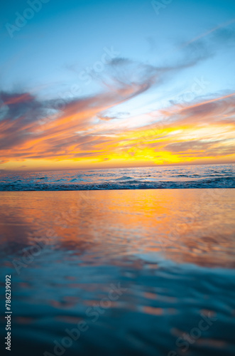 beach at sunset, relaxing space © DAVSAN