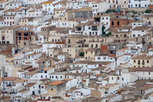 Panoramic view of the town of Alcalá del jucar from Las Eras viewpoint. Its popular cave houses, carved into the mountain, the castle and Church of San Andrés in the gorge of the jucar river, Albacete photo