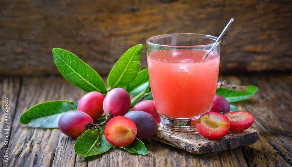 Healthy Hydration: Carandas-Plum Juice Glass on Rustic Background Healthy Hydration: Carandas-Plum Juice Glass on Rustic Background