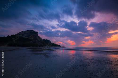 morning beach scenery,Bright and dynamic sea beach sunrise with bright blue skies and colorful clouds