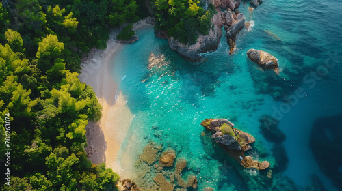 A breathtaking aerial perspective of a private beach with pristine waters and vibrant vegetation