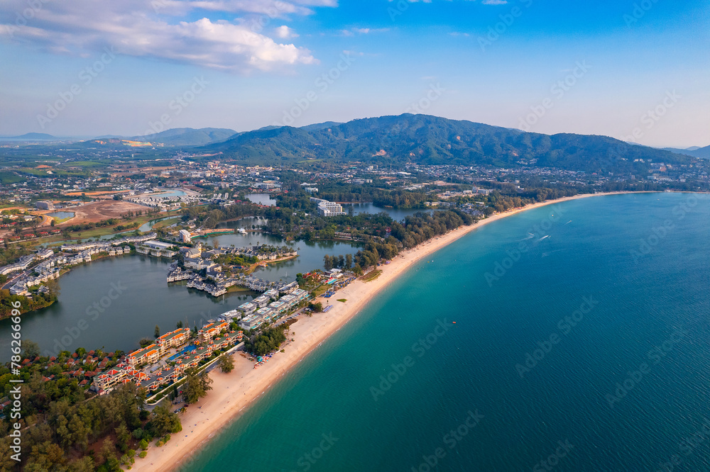 Fototapeta premium Aerial top view panorama sunset Bang Tao beach with sea of Phuket paradise. Concept tropical travel photo Thailand