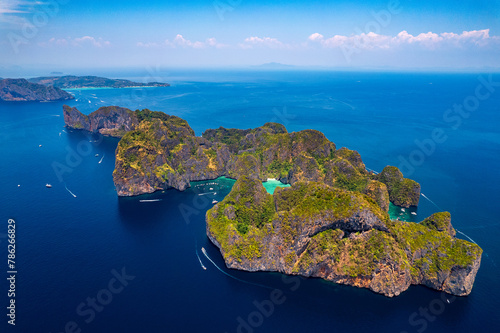 Travel drone photo of Phi Phi Leh with Maya Bay and Pileh Lagoon, Krabi province, Thailand. Aerial top view of amazing tropical island with turquoise water and white beach © Parilov