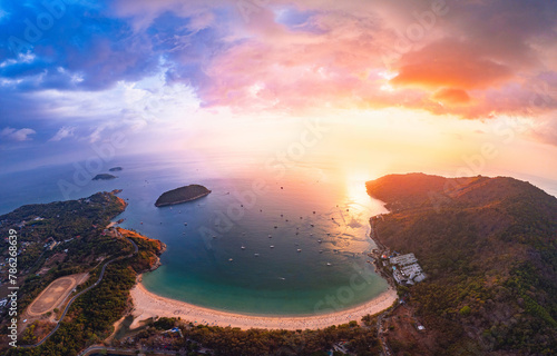 Beautiful panorama Rawai Phuket, sunset on Nai Harn beach and blue sea, travel paradise Thailand, aerial top view