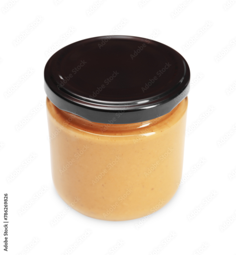 Tasty nut paste in jar isolated on white Tasty nut paste in jar isolated on white