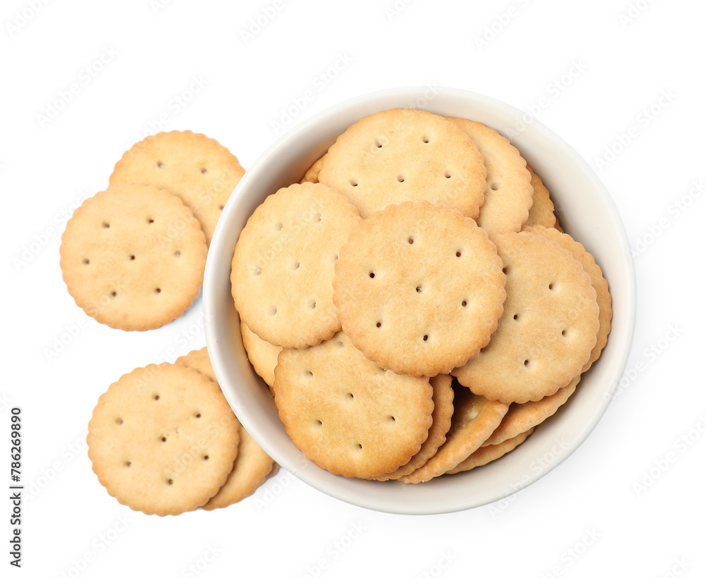 Tasty crackers in bowl isolated on white, top view Tasty crackers in bowl isolated on white, top view