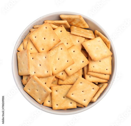 Tasty crackers in bowl isolated on white, top view