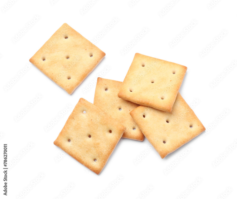 Tasty crispy square crackers isolated on white, top view Tasty crispy square crackers isolated on white, top view
