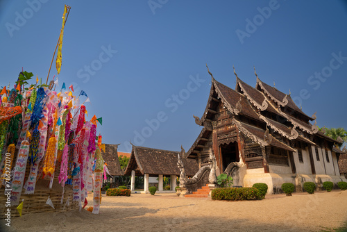 people come to make merit at Wat Ton kwen (Intharawat) temple in songkran festival Lanna tradition day photo