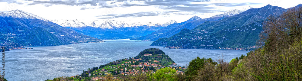 Lake Como village Bellagio panorama background snowy mountains in Italy, Europe
