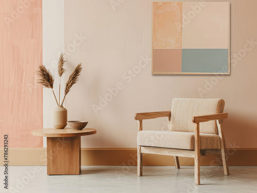 A chair is sitting in front of a wall with a painting on it