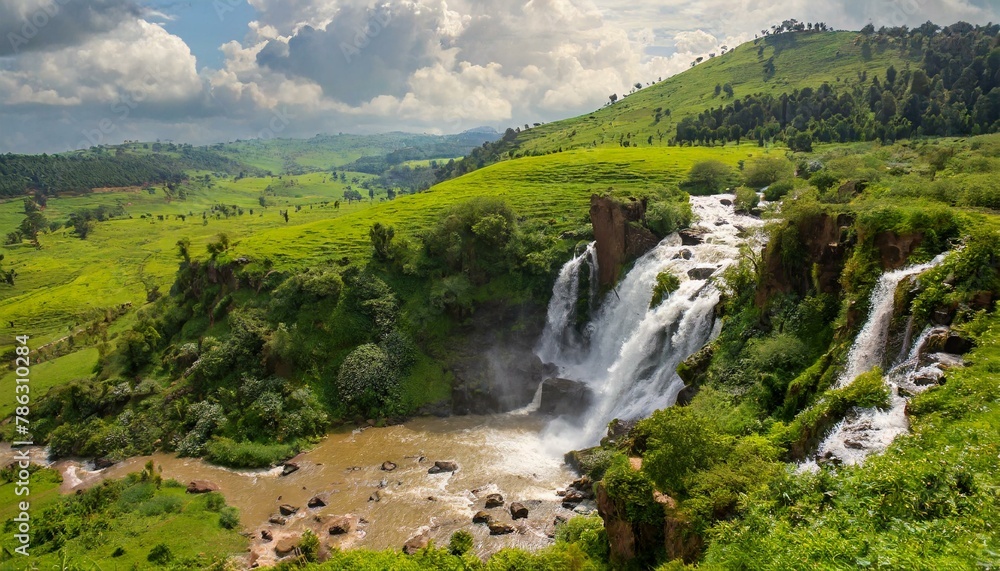 Fototapeta premium The view of the waterfalls flowing after the rainy season and the slopes of Savak mountains