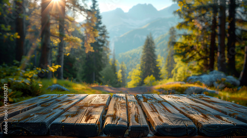 Wooden table in front of beautiful mountain background.  photo