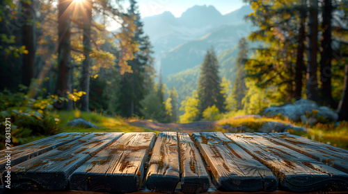 Wooden table in front of beautiful mountain background. 