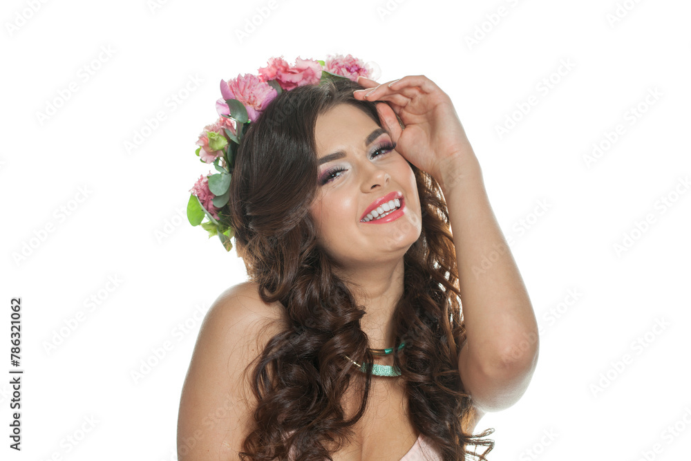 Naklejka premium Joyful young model with long curly hair, makeup and perfect healthy skin, floral blossom portrait. Spring beauty, cosmetology, facial treatment, skincare and haircare concept