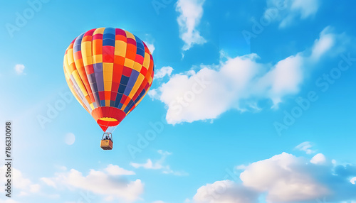 Colorful hot air balloon in the clear sky © Nate