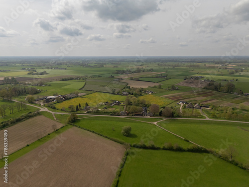 Aerial View: Countryside Road along the IJssel River Dike in Netherlands (ID: 786339490)