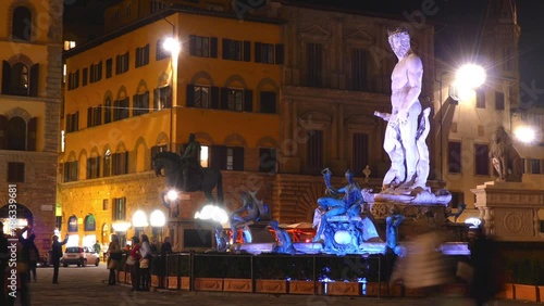 FLORENCE, ITALY - NOVEMBER 23 2016: Fountain of Neptune is fountain, situated on Piazza Signoria (Signoria square), in front of Palazzo Vecchio. It was commissioned in 1565 from Baccio Bandinelli. photo