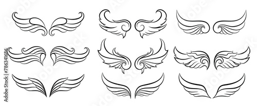 Vintage wings set. Spread wings of an angel, bird and bat. Decorative element of heraldry. Design elements for logo, label, emblem, sign, trademark. Isolated. Vector illustration