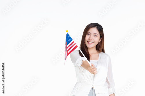 Young woman asian smiling confident holding united states flag over isolated white background, portrait young woman concept.