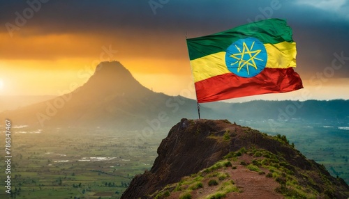 The Flag of Ethiopia On The Mountain. photo