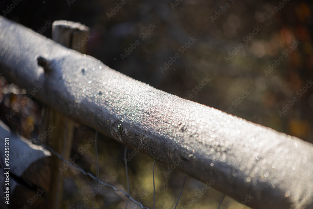 frost on wooden fence in very cold day frost on wooden fence in very cold day