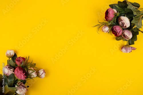 Decorative piones flowers on yellow background with frame for text