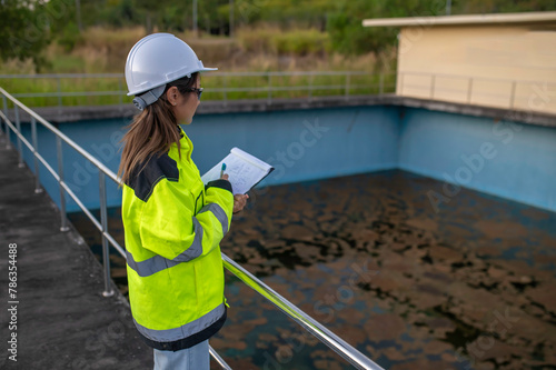 Environmental engineers work at wastewater treatment plants,Water supply engineering working at Water recycling plant for reuse