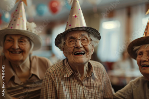 Smiling seniors doing the cha-cha in a decorated nursing home lounge, complete with a 'Happy Birthday' banner and confetti photo