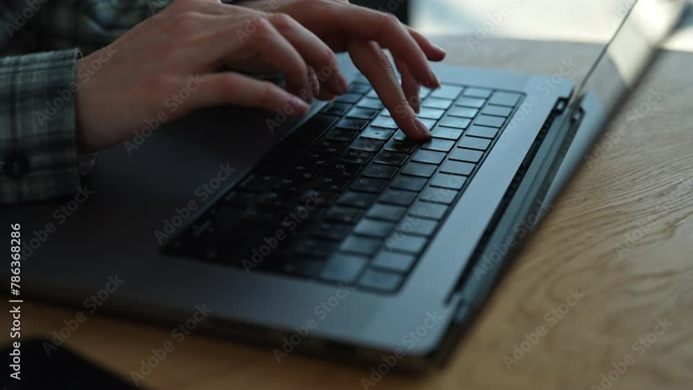 Closeup hands of unrecognizable freelancer developer female typing program code on laptop keyboard in coworking. Tracking shot of copywriter writing text on computer keyboard in dark coffeeshop. Closeup hands of unrecognizable freelancer developer female typing program code on laptop keyboard in coworking. Tracking shot of copywriter writing text on computer keyboard in dark coffeeshop.
