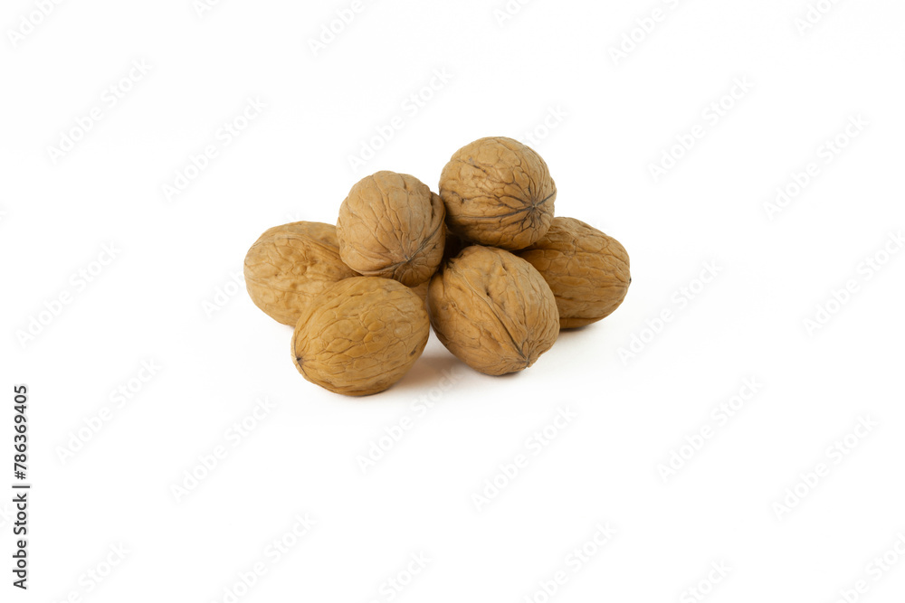 Heap of walnuts isolated on a white background Heap of walnuts isolated on a white background