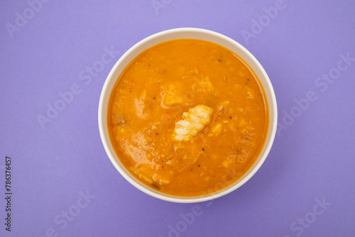 fish creme soup in big white bowl