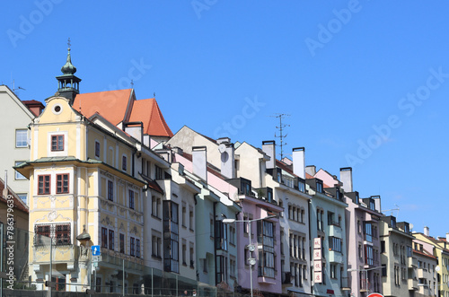 Old town of Bratislava, Slovakia on sunny spring day. Beautiful buildings, blossoming trees, street view. Architecture of central Europe. 