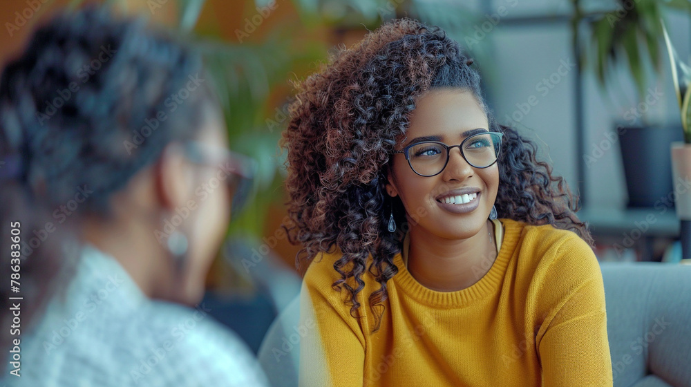 Female Hiring Manager Interviewing A Job Candidate In Her Office Female Hiring Manager Interviewing A Job Candidate In Her Office