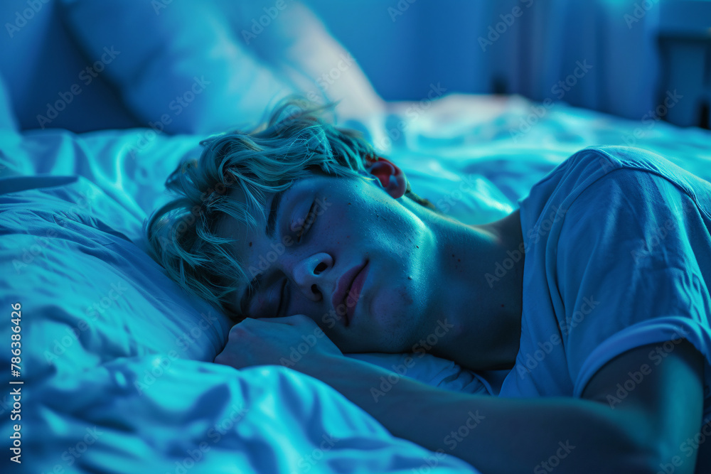 close up young caucasian man sleeping in bed at night. white male sleep hygiene concept good night rest and wellness close up young caucasian man sleeping in bed at night. white male sleep hygiene concept good night rest and wellness
