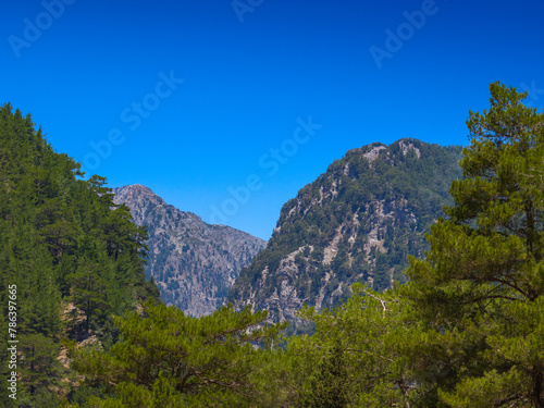 Viewing over rocky mountains on a clear day (Samaria Gorge, Crete, Greece)