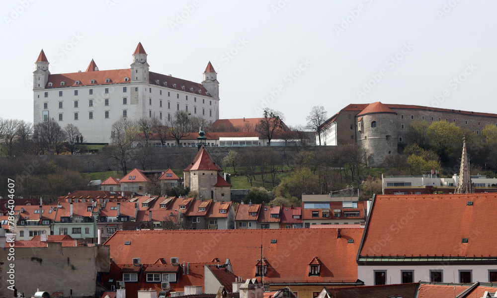 Obraz premium View of the Old Town from the Castle Hill, Bratislava, Slovakia. Street view, old red roofed houses. Spring in Europe.