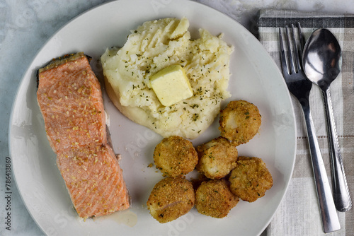 baked salmon  with scallops and mash potatoes