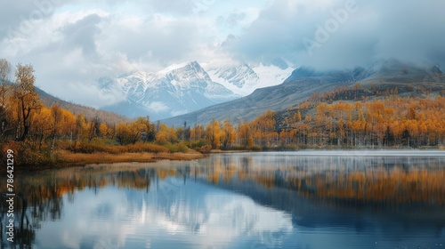 Lake Cicely Altai  Siberia  cloudy autumn day. Taiga  beautiful sky  haze  mountains with snow peaks  panorama.