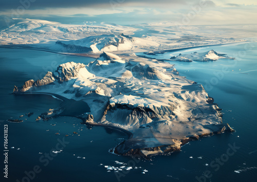 Aerial photo of the snowy Icelandic mountains and sea photo