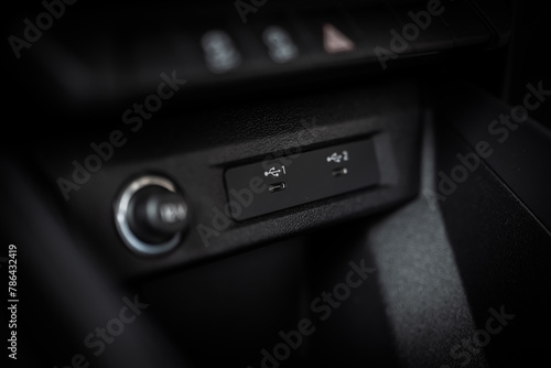 Two USB C ports on front panel in car. Car usb socket for charging and accessories. Car interior.	
