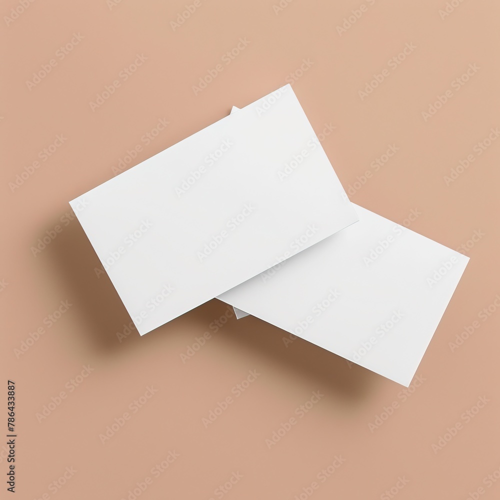 Two blank business cards on a beige background. Two blank business cards on a beige background.