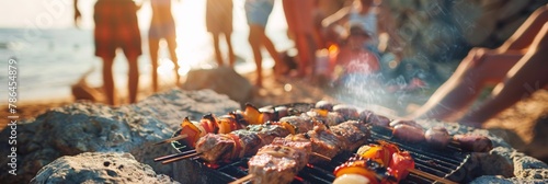 Appetizing aroma of grilled meat wafting from the air at a barbecue party on the beach photo