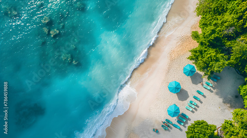 Aerial View of a Pristine Tropical Beach with Sunshades and Turquoise Sea