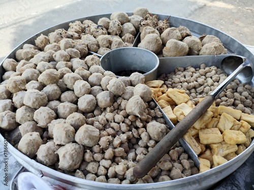 Fototapeta Naklejka Na Ścianę i Meble -  Bakso or baso is an Indonesian meatball, or a meat paste made from beef surimi. Its texture is similar to the Chinese beef ball, fish ball, or pork ball. Pentol or cilok is a type of flour meatball. 